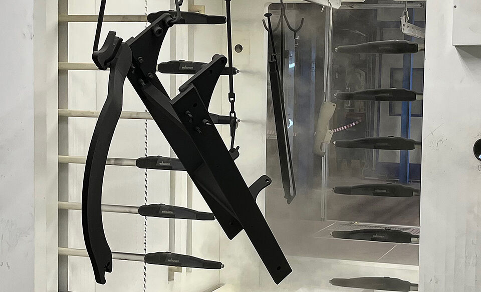 automatic powder coating of agricultural machinery