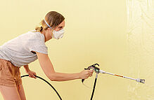 Spraying wall paint