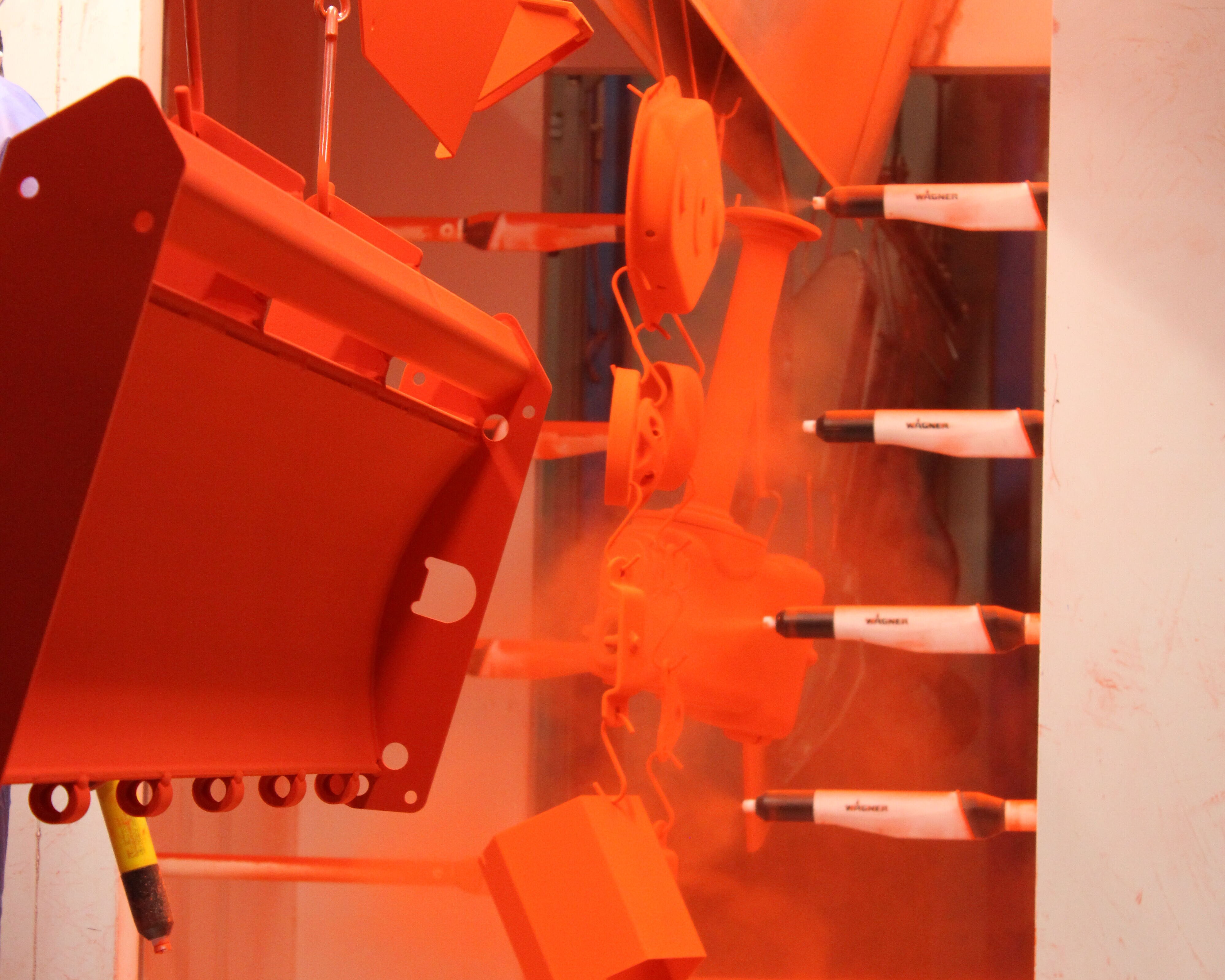 powder coating of agricultural workpieces