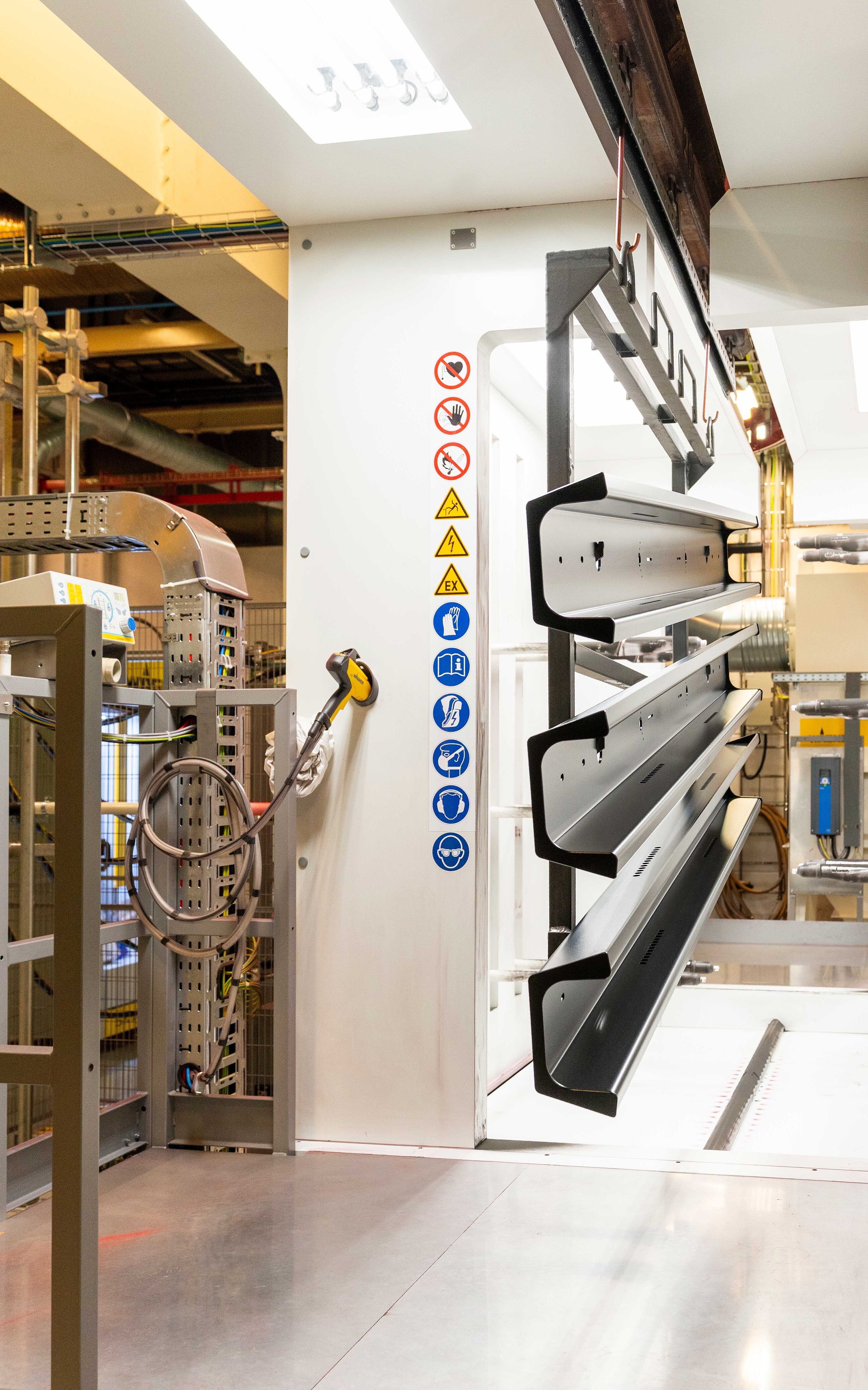 powder coating booth with workpieces