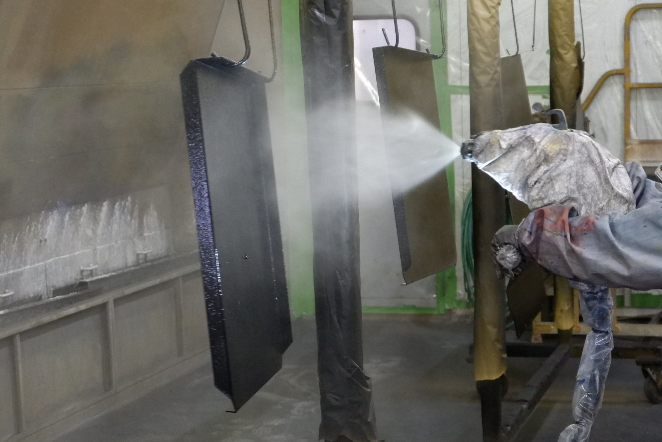 electrostatic manual coating of crane components